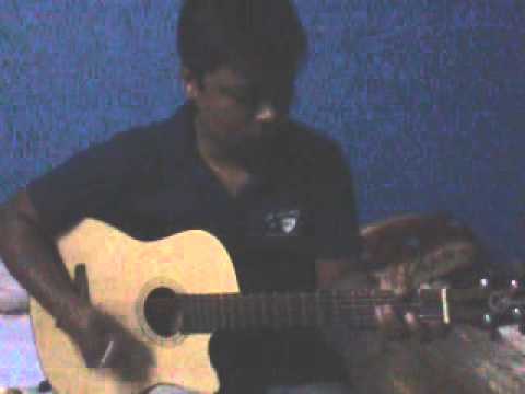 Pankaj playing acoustic guitar