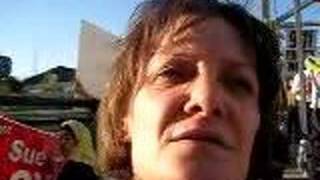 woman on montrose bridge protesting