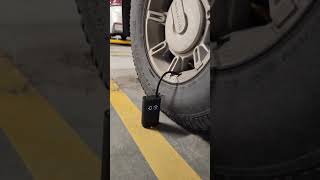Pump up the Hummer H2 wheel - Xiaomi Mi Portable Electric Air Compressor