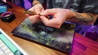 Rolling And Smoking A Dutch Master