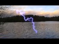 Close lightning strikes seen on a lake