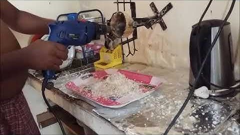 Coconut Scraping With A Electric Drill