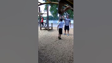 This kid did a back flip off the monkey bars