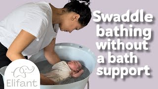 How to Swaddle Bathe a newborn baby. Swaddle Bathing your newborn without a bath support.