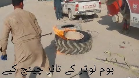 Boom loder change tyre/Changing Caterpillar Wheel Loader Big TiresUsing Talcum Powder Method and