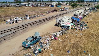 See how a homeless camp may be causing problems along a Fresno County railroad