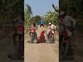 Robber lifts two motorcycles over woman's feet