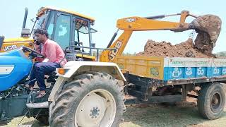 Jcb Loading Mud Tractor Working