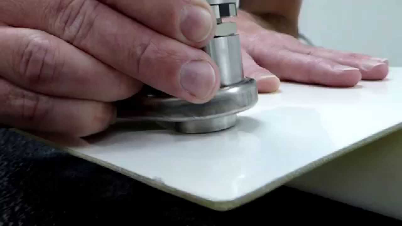 Routing 4mm thick glass epoxy composite panels, freehand & dust free.  DMP0145