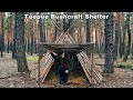 Build natural bushcraft shelter  tipi cabin with door in the woods