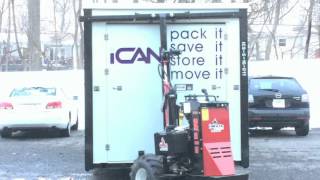 iCan's Storage's iBot placing a container in between cars