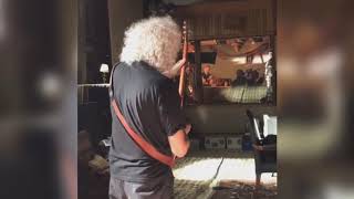 Brian May playing "Bohemian Rhapsody" guitar solo on the movie set screenshot 3