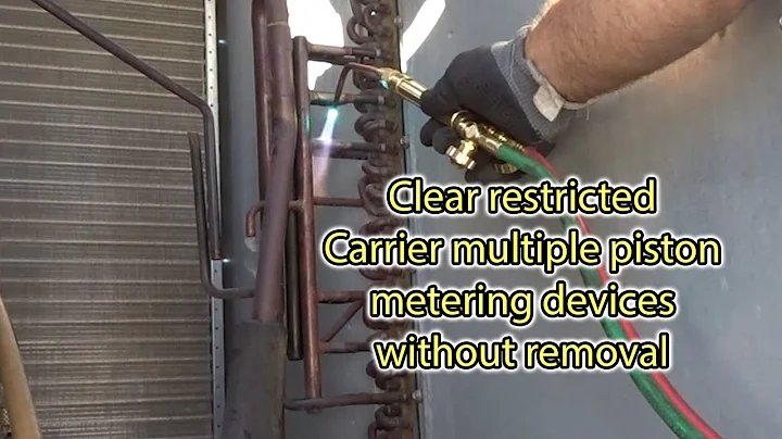 Trick for clearing Carrier multiple orifice manifolds in RTU's without removing them