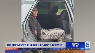 DOJ dismisses charges against activist
