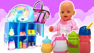 Baby Born alışverişte! Oyuncak bebek için YENİ biberon, çanta ve mayo bez! Bebek bakma oyunu