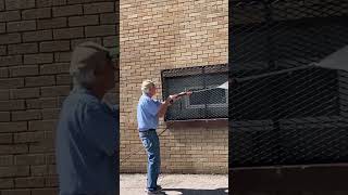 Power washing the back of Prescott School in 2025