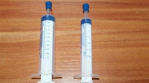 Automatic syringe filling capping machine