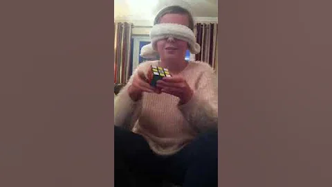 11 year old girl does Rubik cube blindfolded in 10 seconds