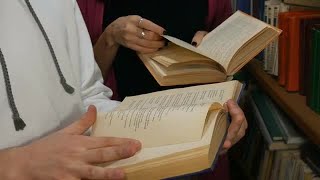 Students Reading Books In Library Stock Video