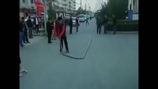 Man Whipping a Massive Chain- Epic Youtube Videos