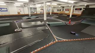 Jiusi MT14R indoor racetrack VS race buggy...