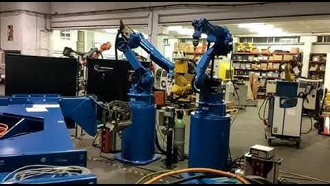 Robot welding cell Motoman - turn table with two robots