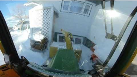 Snowblowing action with the John Deere 322 in Virtual Reality