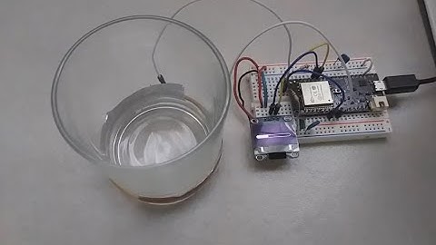 Contactless water level sensor with ESP32 and OLED display