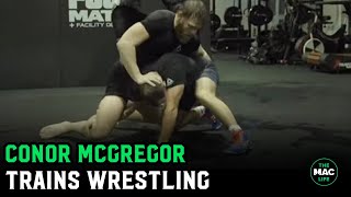 Conor McGregor trains wrestling; works the sweeps