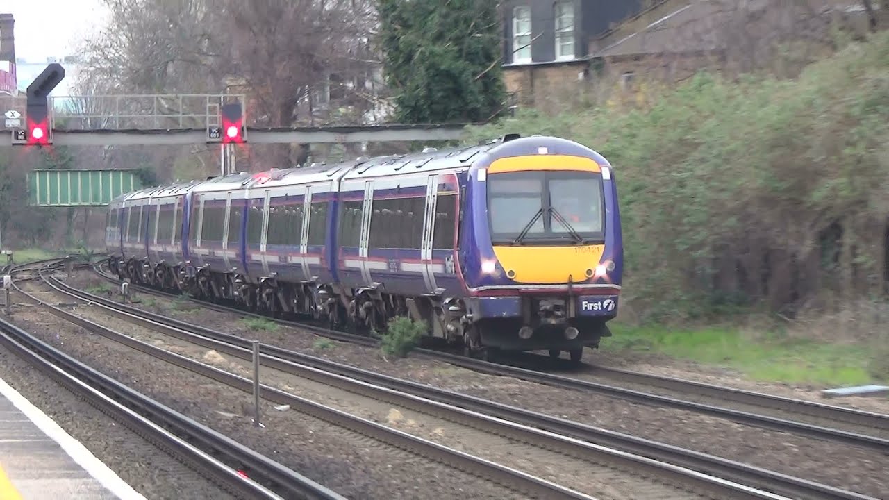 (HD) Scotrail 170421 + 170423 power through Kensington Olympia on 5Z70 Stock Transfer. 4.4.15