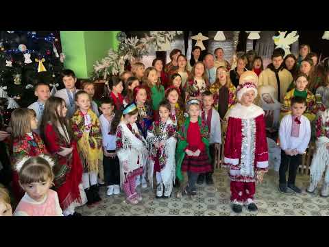 Колядки біля вертепу