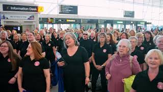Choir Flashmob at Stansted Airport - Buskerteers Choir