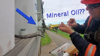 Extracting oil from a Voltage Regulator  7200 volts