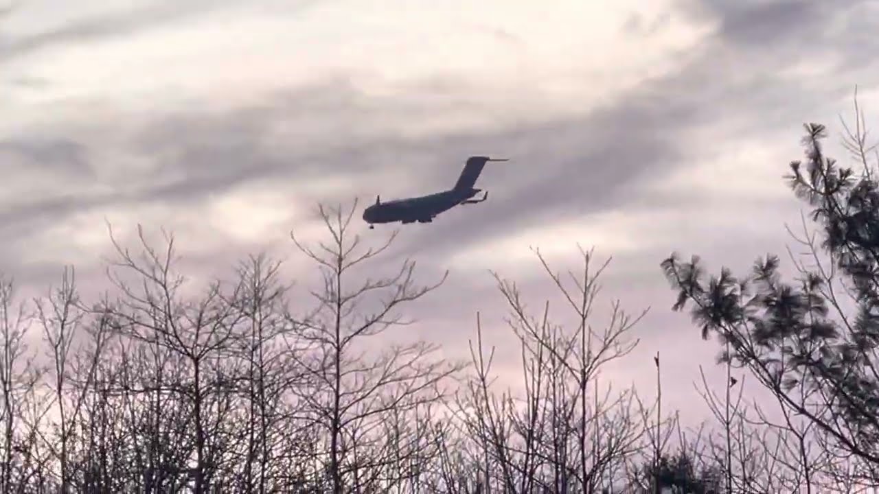 C-17 globemaster flying behind my house