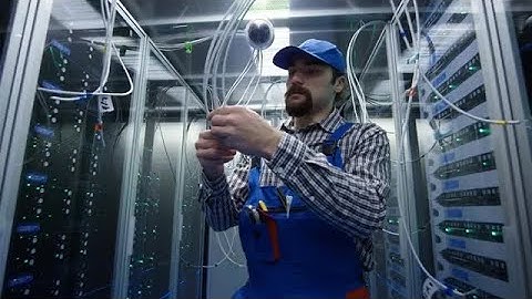 Technician Inspecting Data Cable Clusters Stock Video