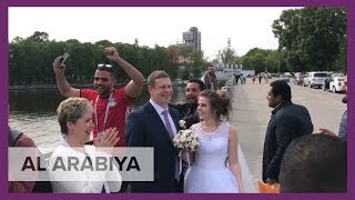 World Cup fans give Egyptian-style wedding send-off to Russian couple