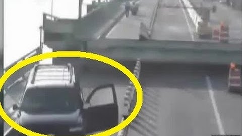 [CCTV] Driver distracted by his GPS caught on camera jumping drawbridge as it opened in Florida