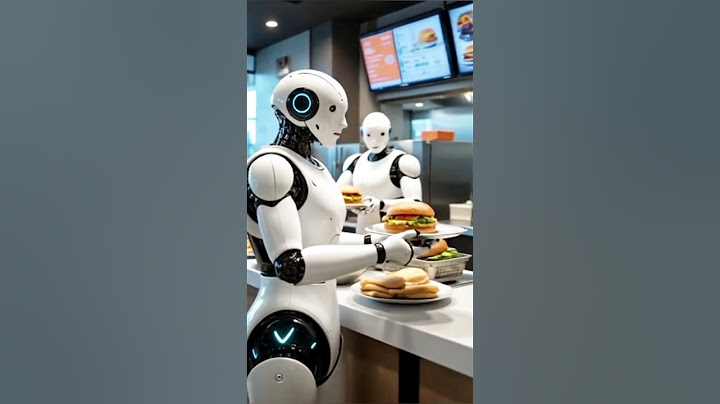 Robots make burger at restaurant.#tesla #robot #robotics #ai #aigenerated #foryou #shorts