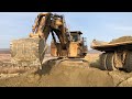 Huge Caterpillar 6040 Excavator Loading Hitachi EH3500 And Terex TR100 Dumpers