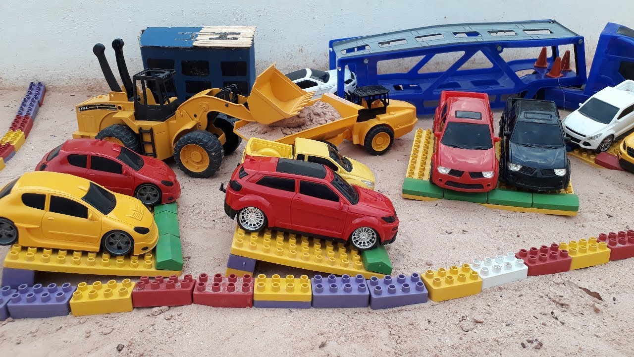 toy, stork trailer, tractor, bucket truck, loader infantile systemic hyalinosis