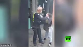 شاهد ضابط شرطة يخنق إمرأة وسط الشارع بعد رفضها إرتداء الكمامة
