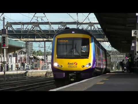 First Transpennine Express 170303 and 170308 departing Doncaster