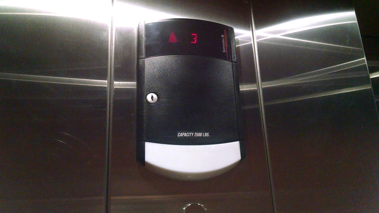 Small Schindler HT Elevator @ The Hampton Inn in Batavia, NY - Please set to HD for best viewing.

This is the elevator at the Hampton Inn in Batavia, NY. It is a basic but decent Schindler HT that is a little low on oil.

