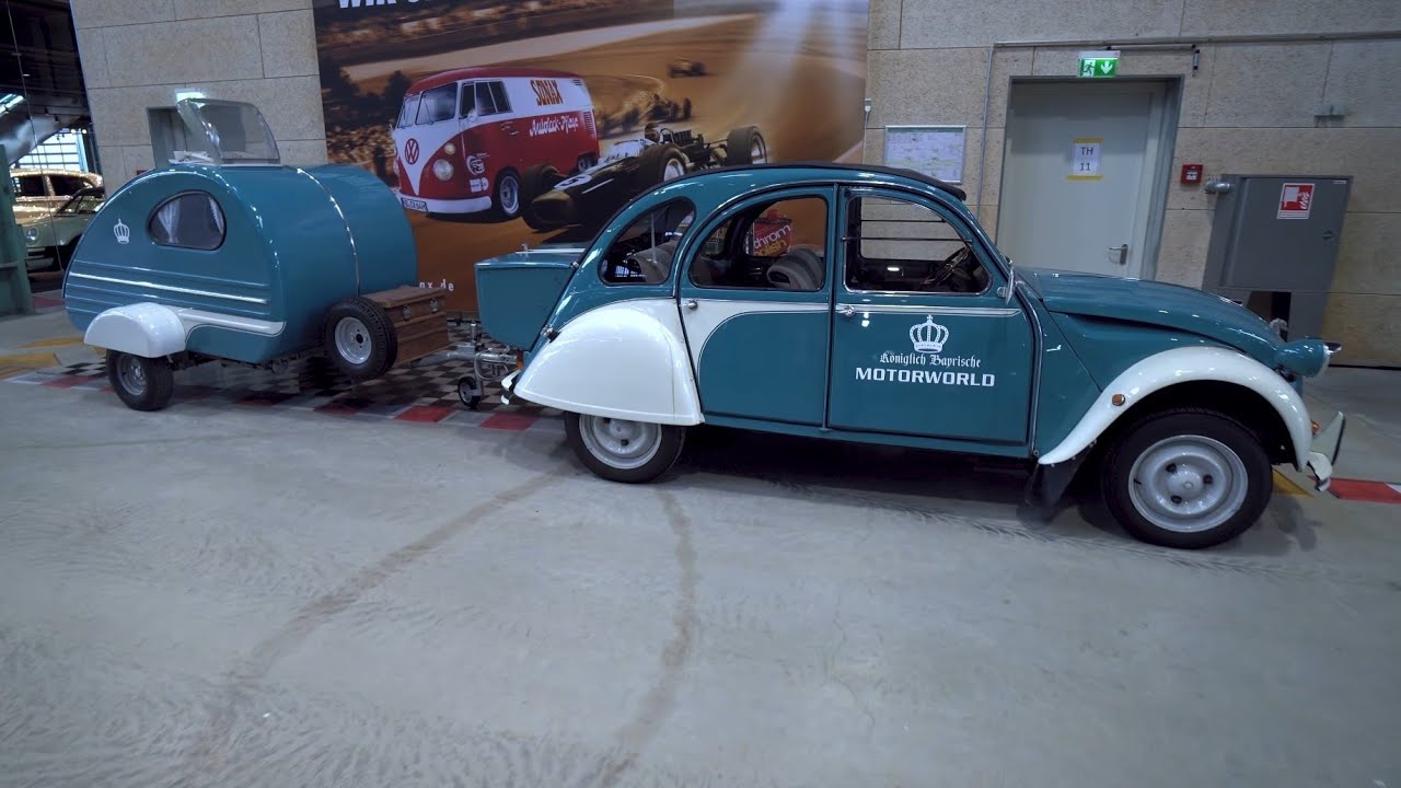 Schönste Camping Ente der Welt: 2CV Wohnwagen Gespann. Zitrön mit Oktoberfest Anhänger. Quickie.