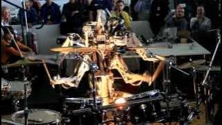 4 Armed Mohawked Robot playing the drums