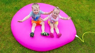 Gaby Alex and Mommy playing with Giant Water Balloon