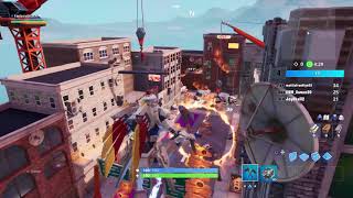 Fortnite: How to Jump Through All 6 Flaming Hoops in Downtown Drop