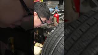 Vinny's doing a quick tire change on this MINI Two Door Convertible.