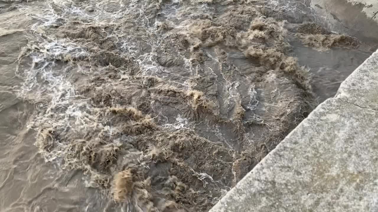 Flood water rushes at Alameda Creek at Niles Canyon