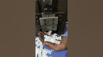 Paper folding and cutting machine